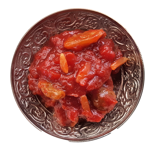 Range Tasmania Sweet Tomato Chutney served in ornate silver bowl - elegant presentation of gourmet tomato and almond chutney