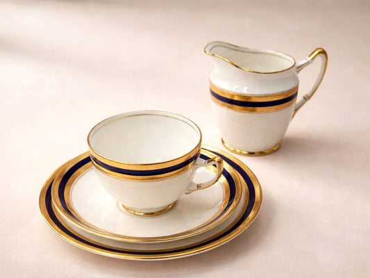 Stuart's grandmother's 1923 Royal Albert tea service in cobalt blue and gold, featured on Range Tasmania shortbread boxes, inspired by...