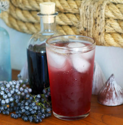 Premium Tasmanian artisanal elderberry vinegar spritz gourmet drink with ice soda water