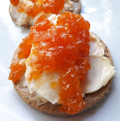 carrot and lime jam served on crackers with Tasmanian soft cream cheese