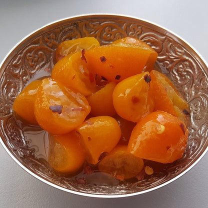 range Tasmania sweet chilli cumquats served in a ornate silver dish